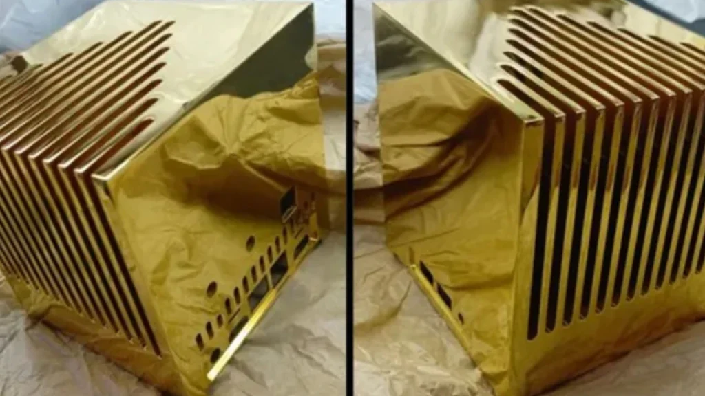 Solid gold mini computer sells for .7 million and weighs nearly 13 kilograms Solid gold mini computer sells for .7 million and weighs nearly 13 kilograms