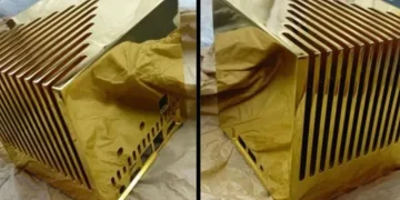 Solid gold mini computer sells for .7 million and weighs nearly 13 kilograms